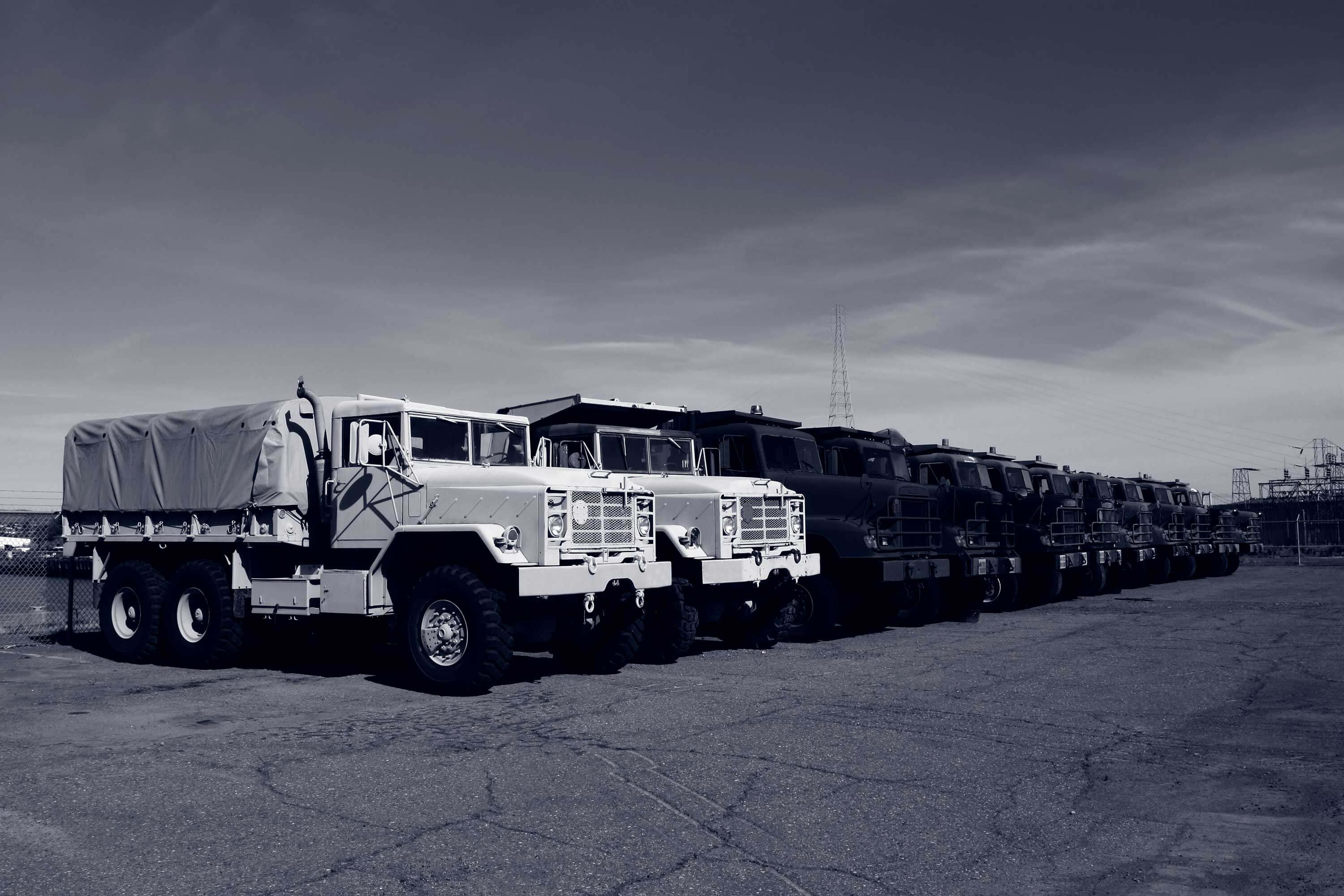 military trucks lined up outside