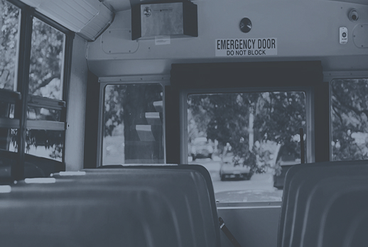 School bus interior with seats and emergency exit
