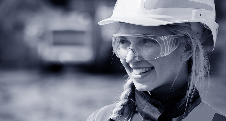 Woman wearing goggles and hard hat