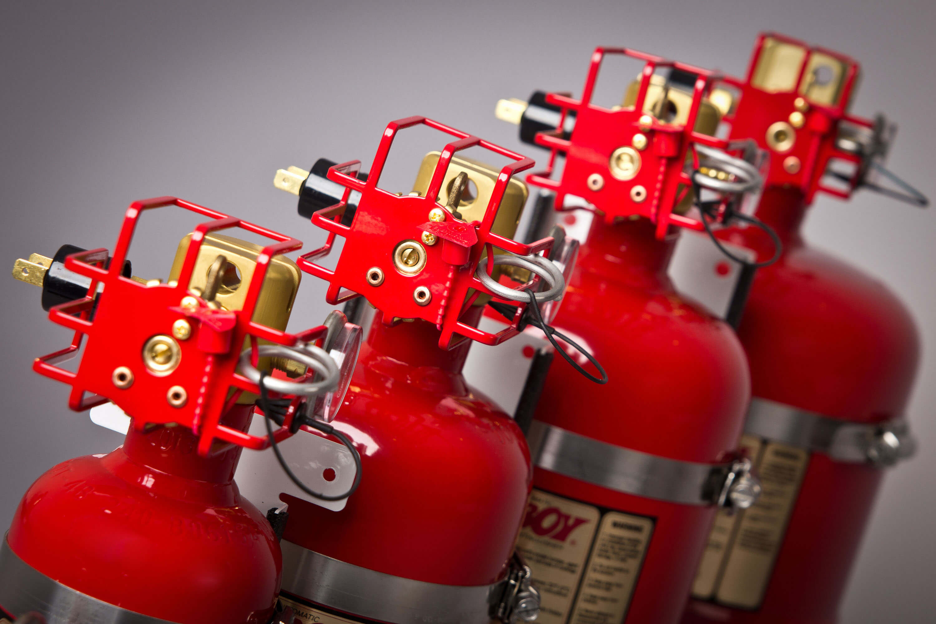 three fire extinguishers