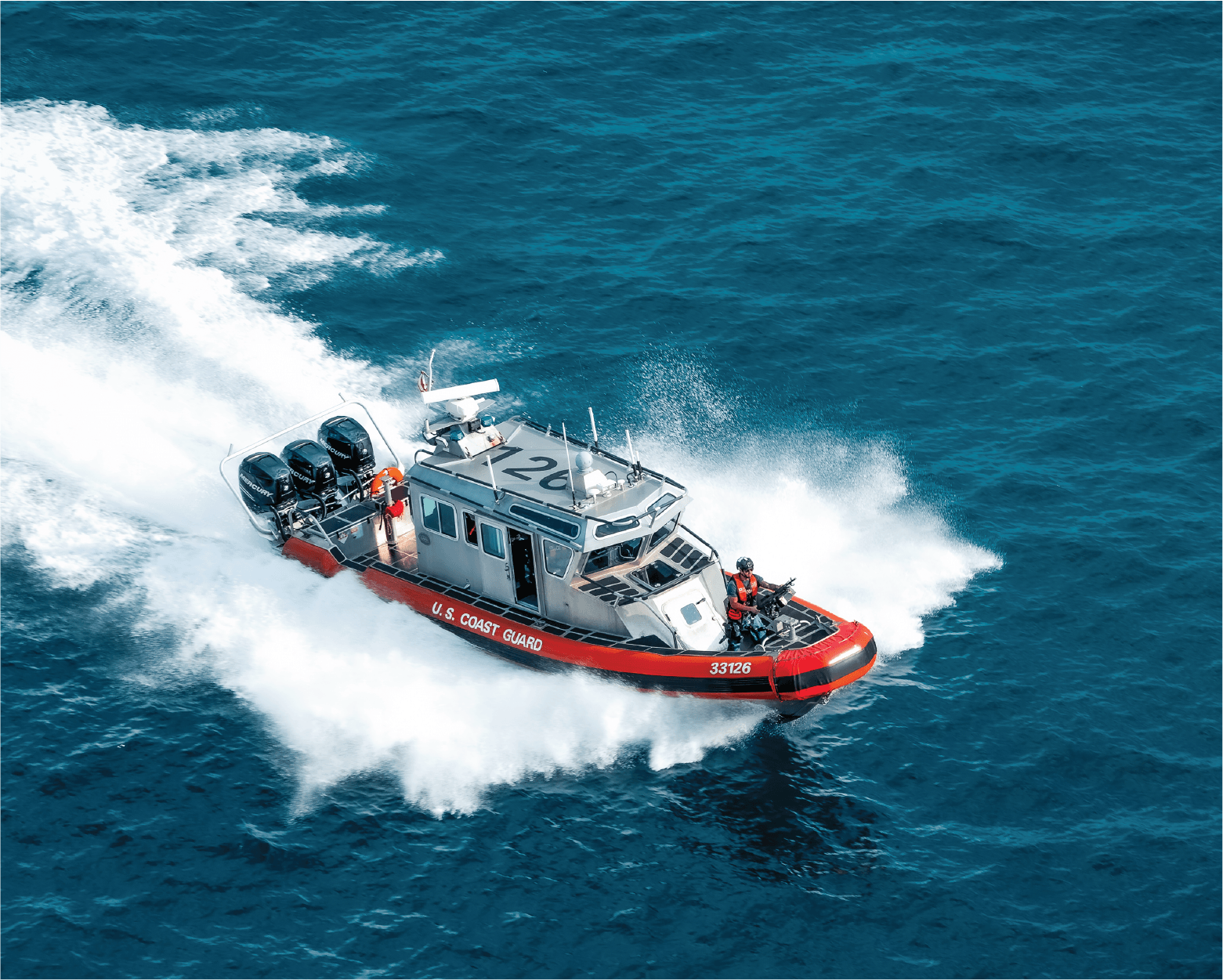 coast guard boat driving in the water